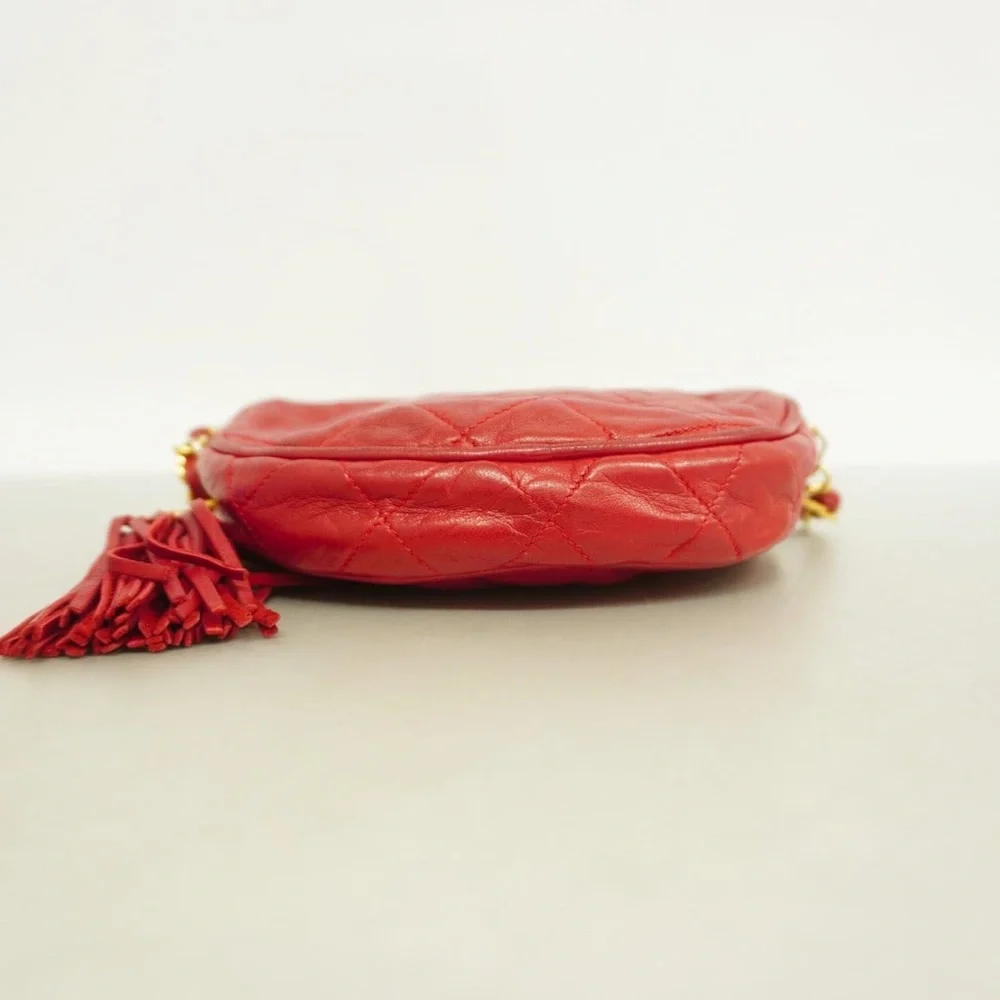 Authentic CHANEL RED LAMBSKIN tassel round mini vintage bag